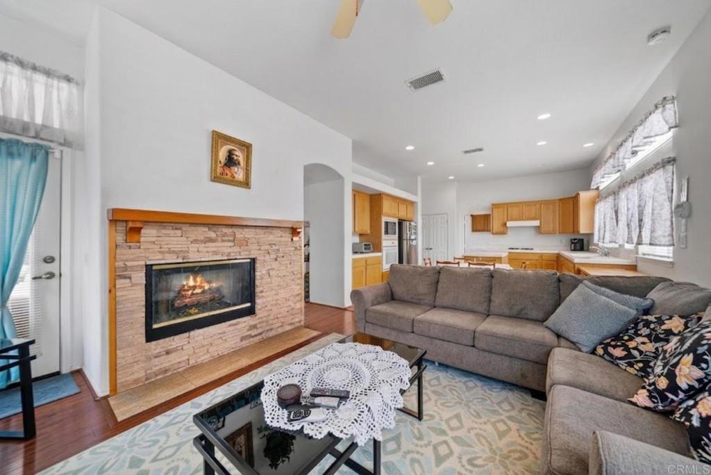 1999 Pecan Tree Street Hemet, CA 92545 - Photo 10 of 38 a living room with furniture and a fireplace