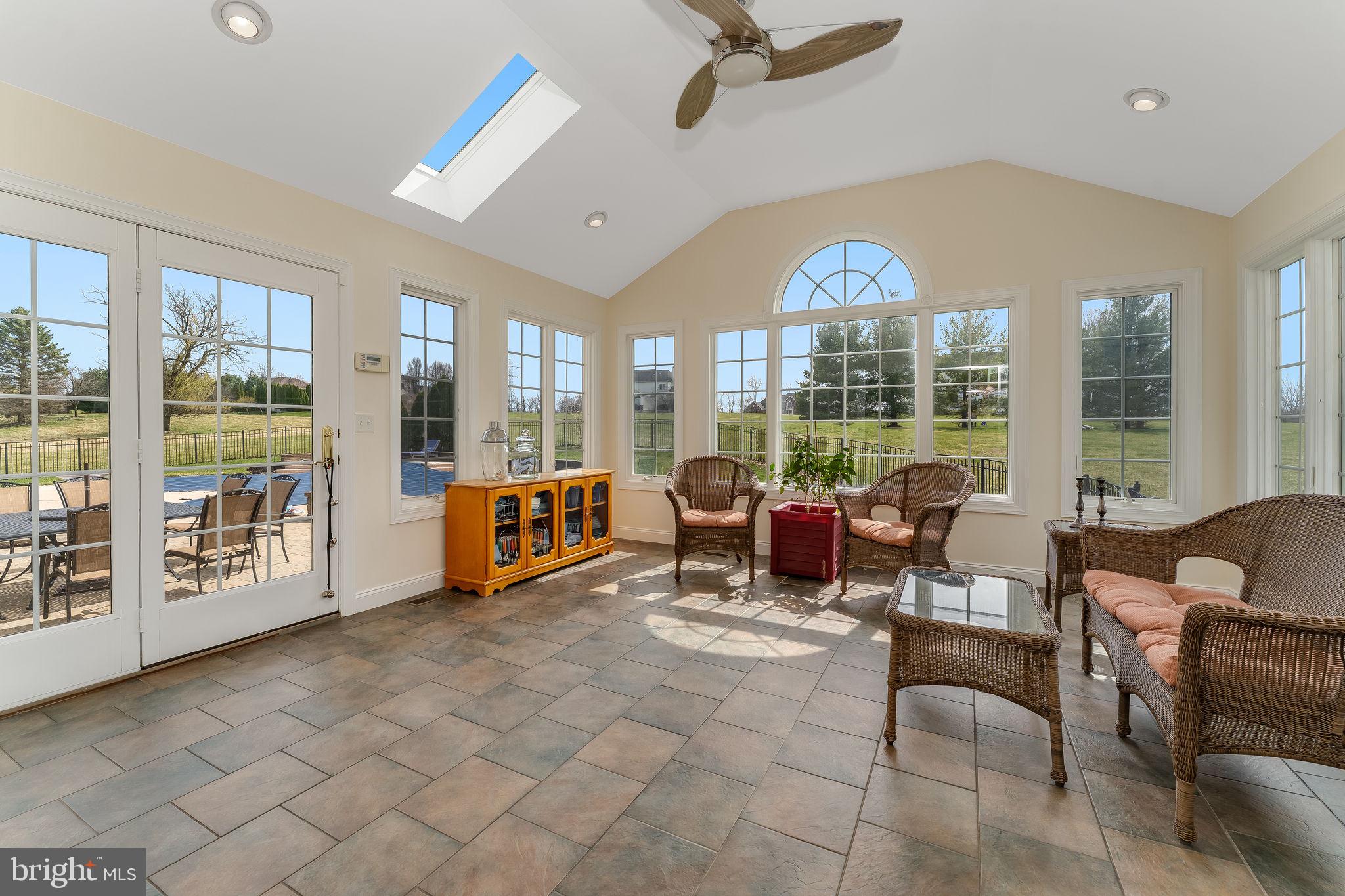 11 Baker Way Pennington, NJ 08534 - Photo 13 of 41 a living room with furniture and a large window