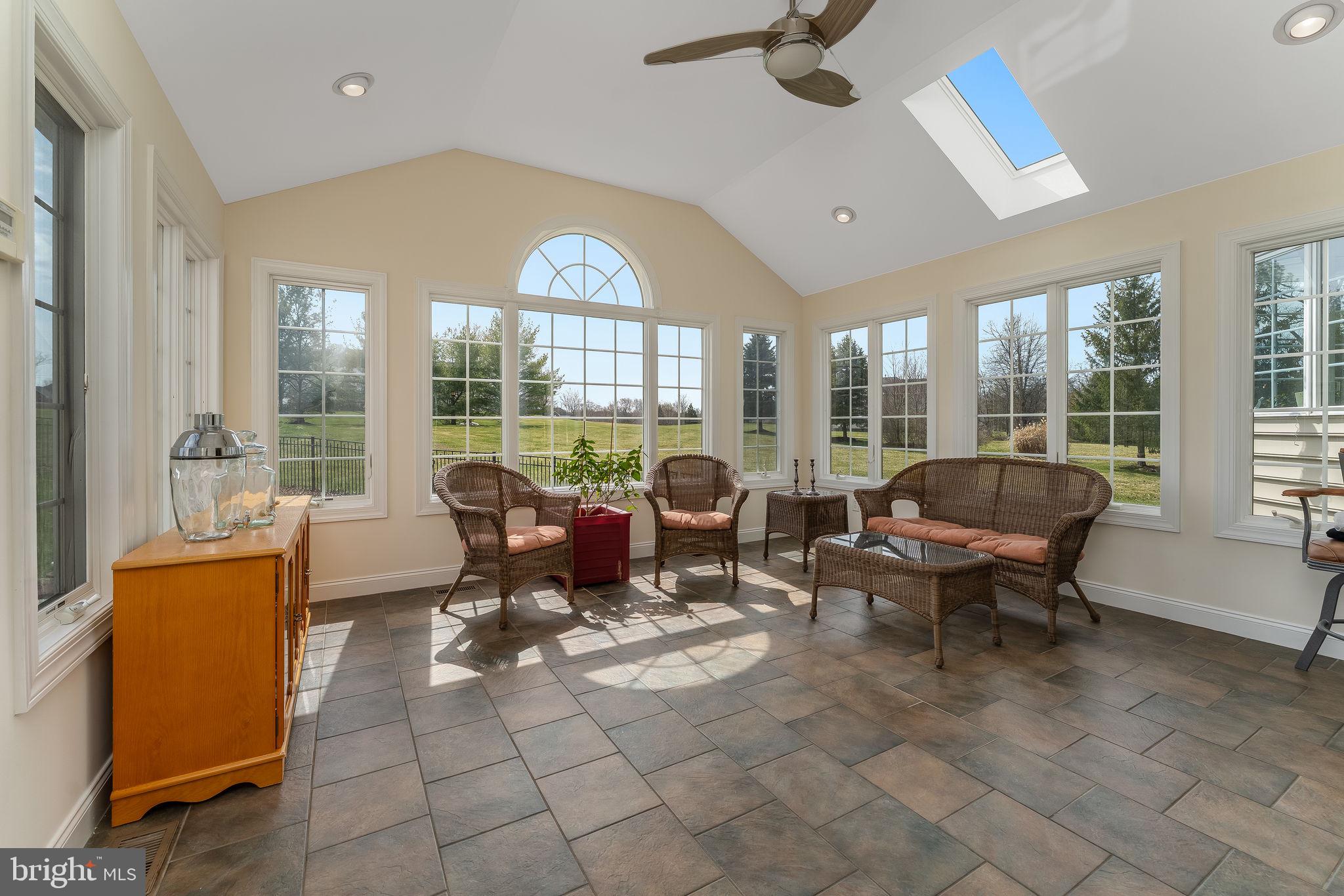 11 Baker Way Pennington, NJ 08534 - Photo 14 of 41 a living room with fireplace furniture and a large window