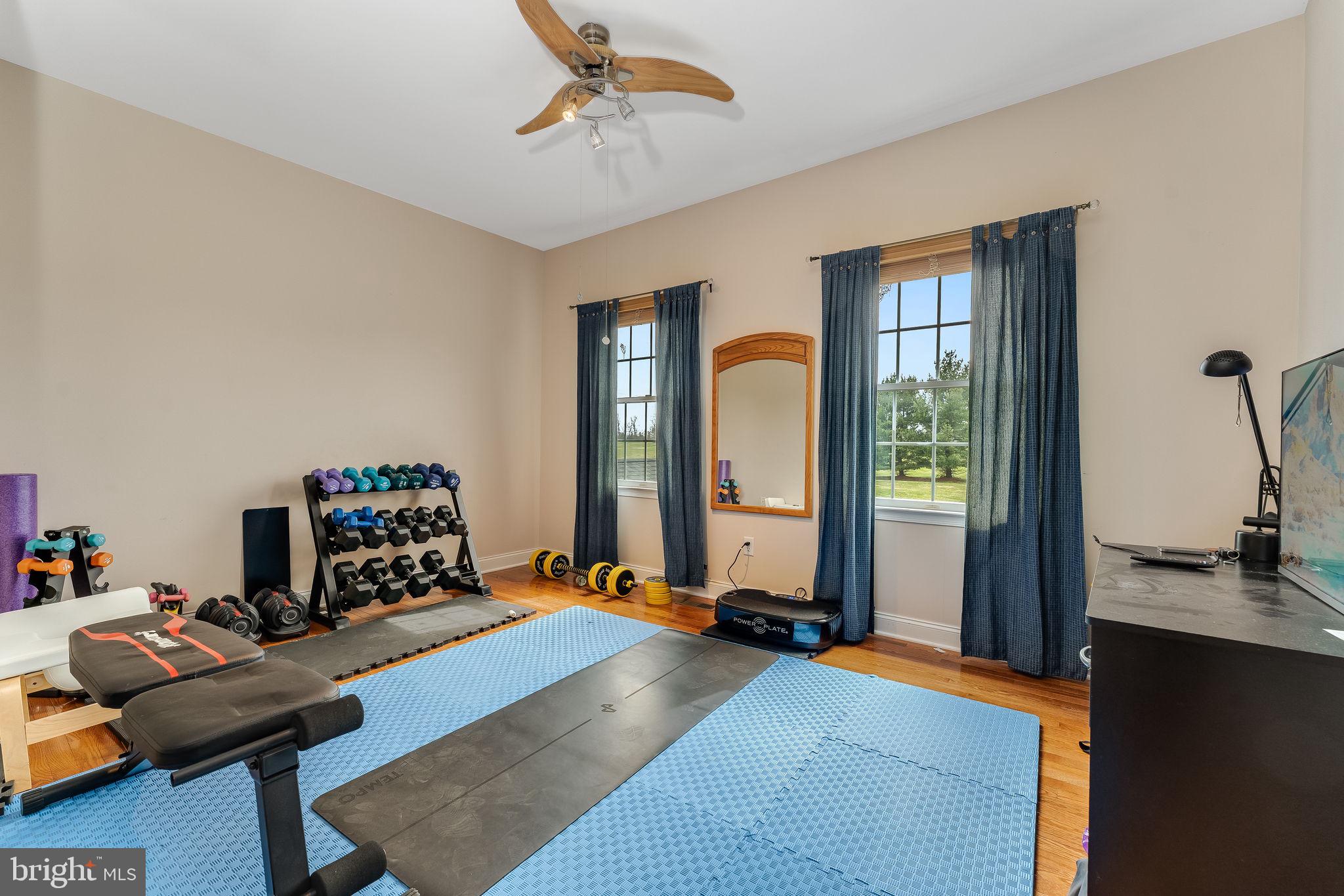 11 Baker Way Pennington, NJ 08534 - Photo 27 of 41 a bedroom with furniture and a window