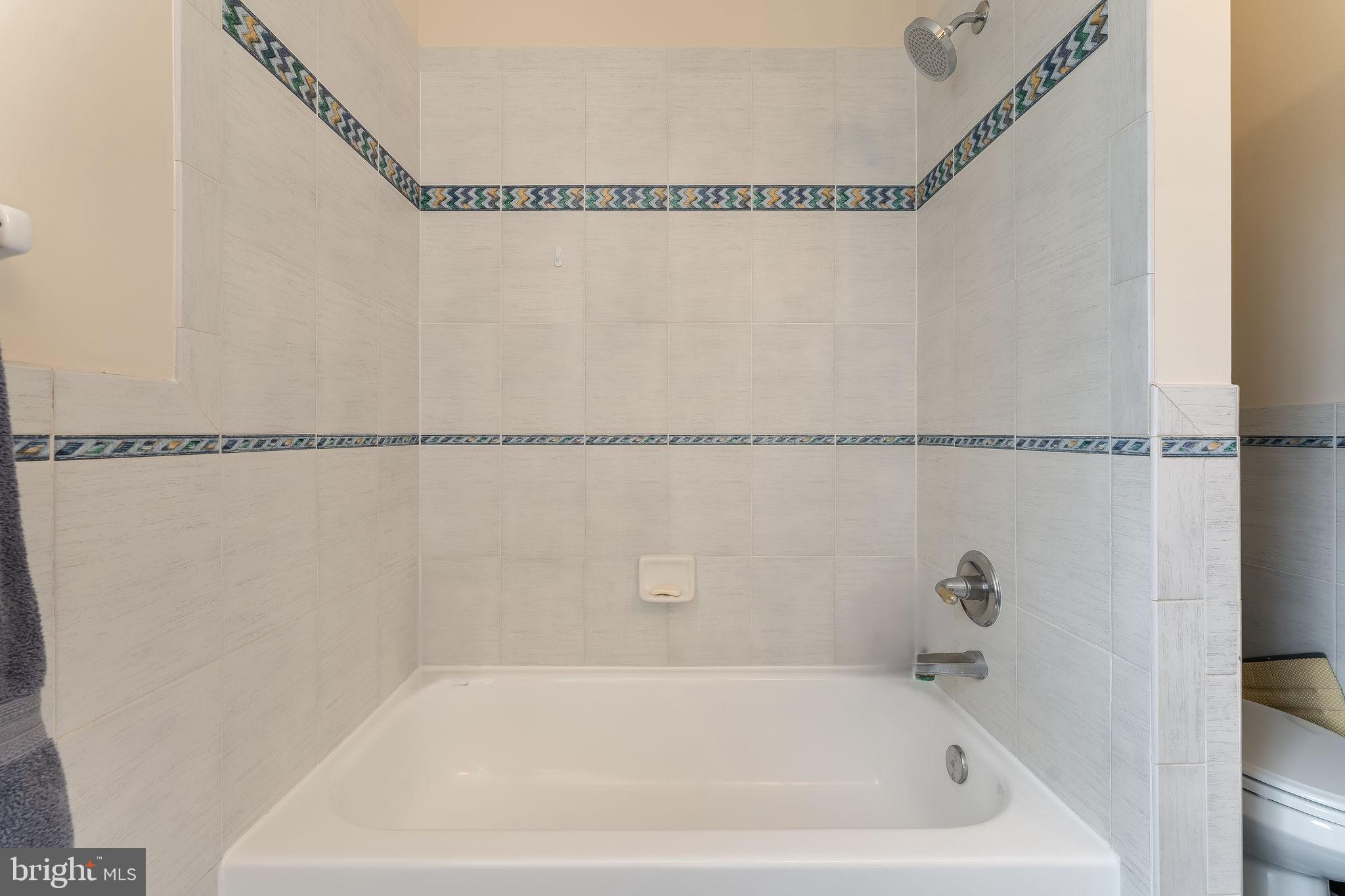 11 Baker Way Pennington, NJ 08534 - Photo 32 of 41 a bathroom with a bathtub