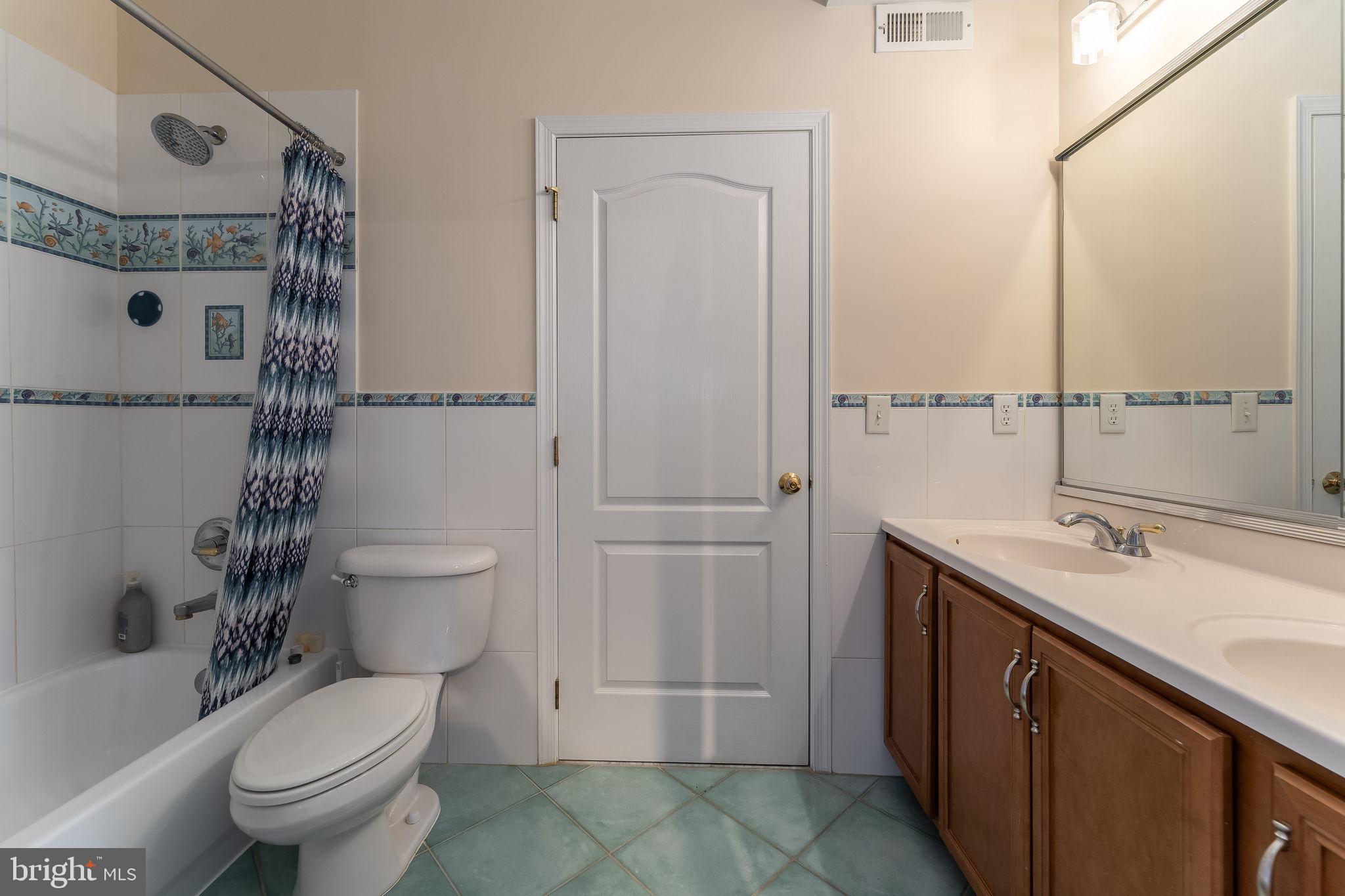 11 Baker Way Pennington, NJ 08534 - Photo 33 of 41 a bathroom with a granite countertop sink toilet and shower