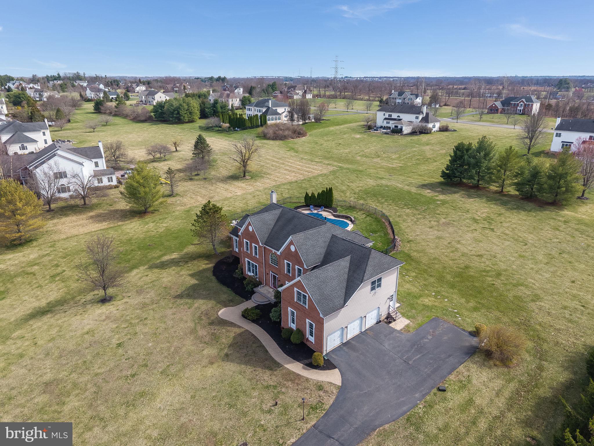11 Baker Way Pennington, NJ 08534 - Photo 38 of 41 an aerial view of a house with a yard and lake view