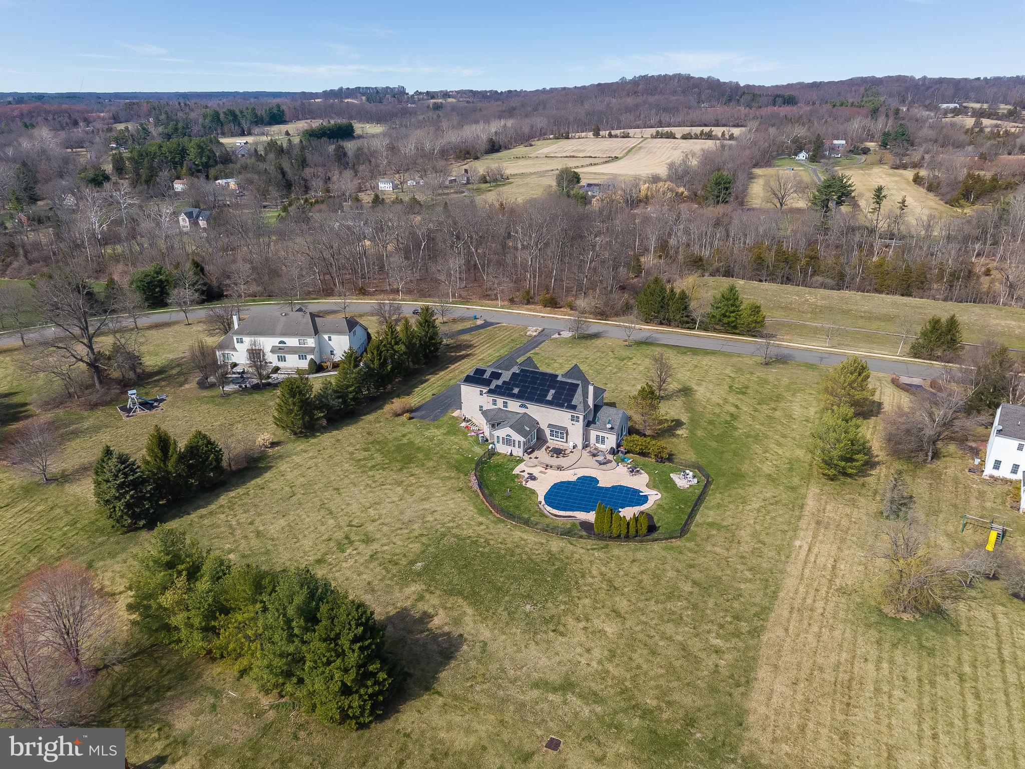 11 Baker Way Pennington, NJ 08534 - Photo 40 of 41 a view of a swimming pool with a yard
