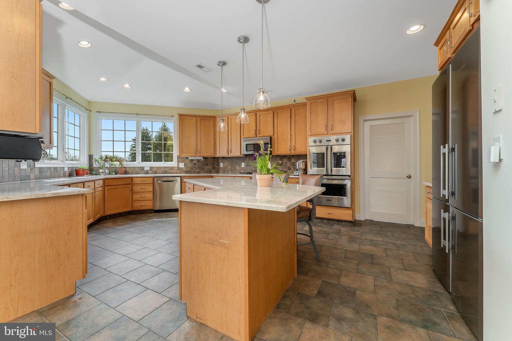 11 Baker Way Pennington, NJ 08534 - Photo 7 of 41 a kitchen with counter top space cabinets and appliances