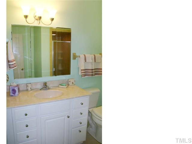 5026 Raintree Road Durham, NC 27712 - Photo 9 of 12 One of 3 Full Baths, all updated, this one has a fully tiled shower. In addition, the master bath has a larger shower and the hall bath has a tiled tub/shower combo. Bathroom