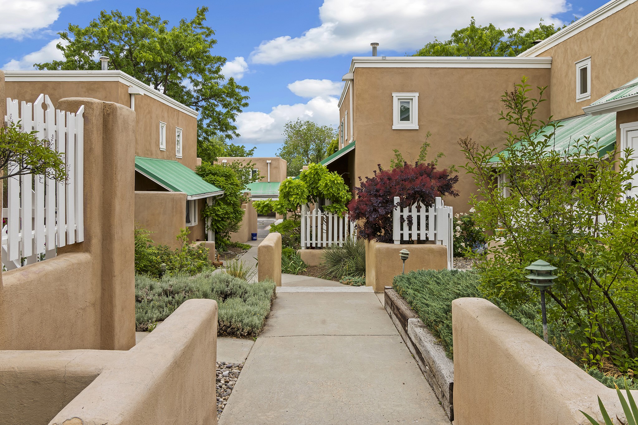 501 Rio Grande Avenue, Unit A7 Santa Fe, NM 87501 - Photo 27 of 28 The walkway to the pool