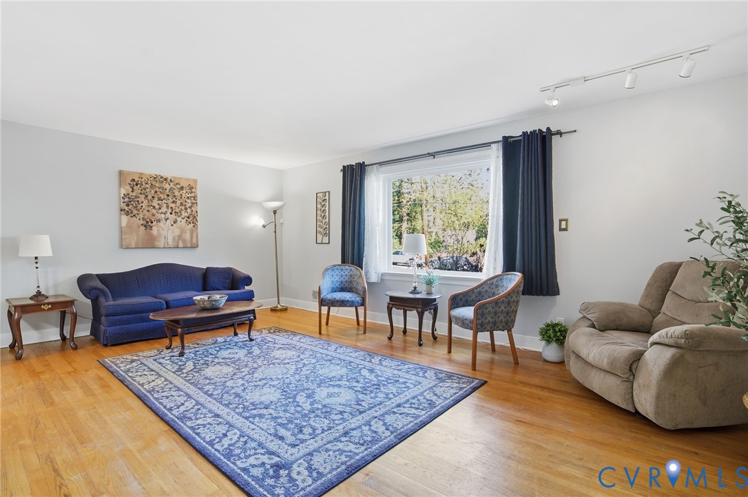 700 Brantley Road North Chesterfield, VA 23235 - Photo 12 of 40 a living room with furniture and a rug