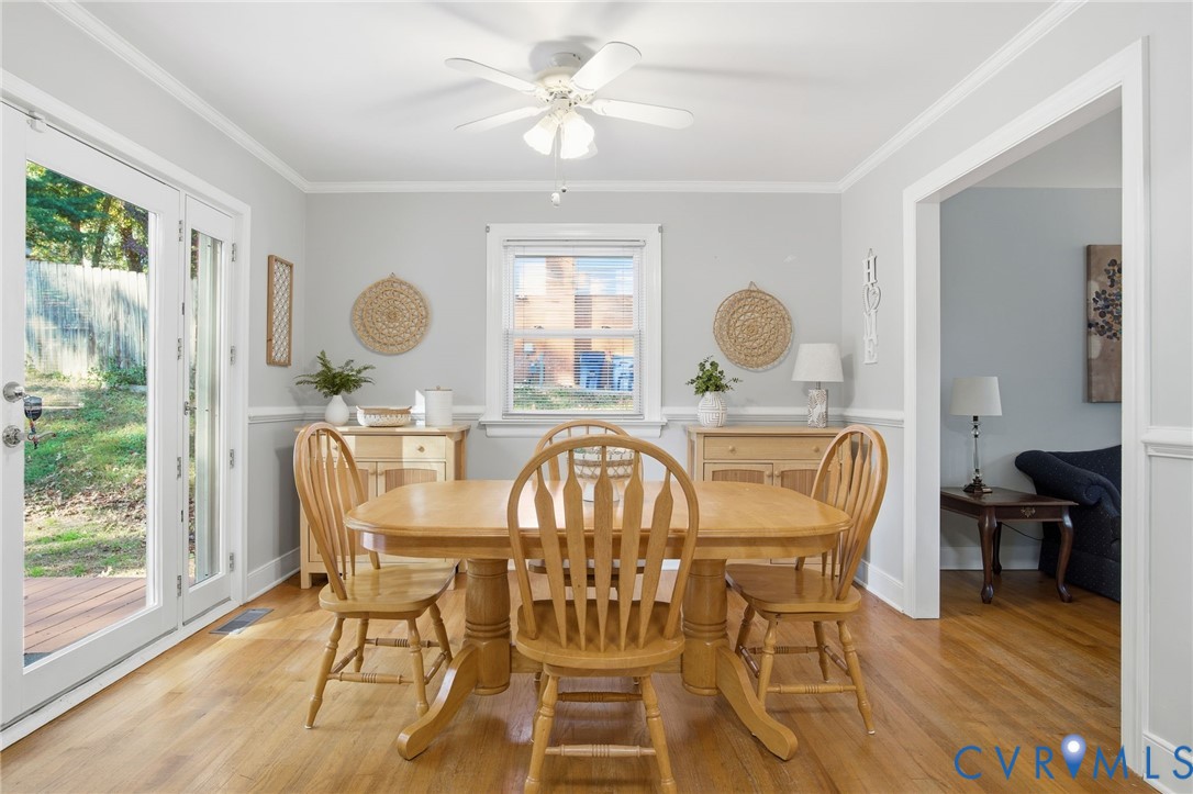 700 Brantley Road North Chesterfield, VA 23235 - Photo 17 of 40 a view of a dining room with furniture window and wooden floor