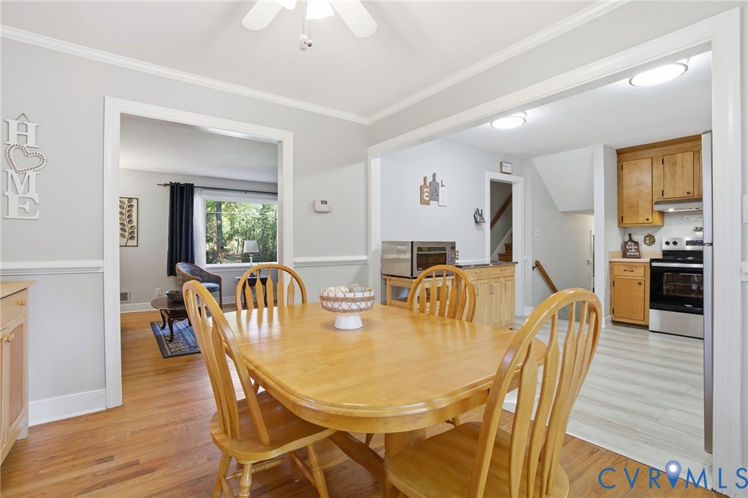 700 Brantley Road North Chesterfield, VA 23235 - Photo 18 of 40 a dining room with furniture and wooden floor