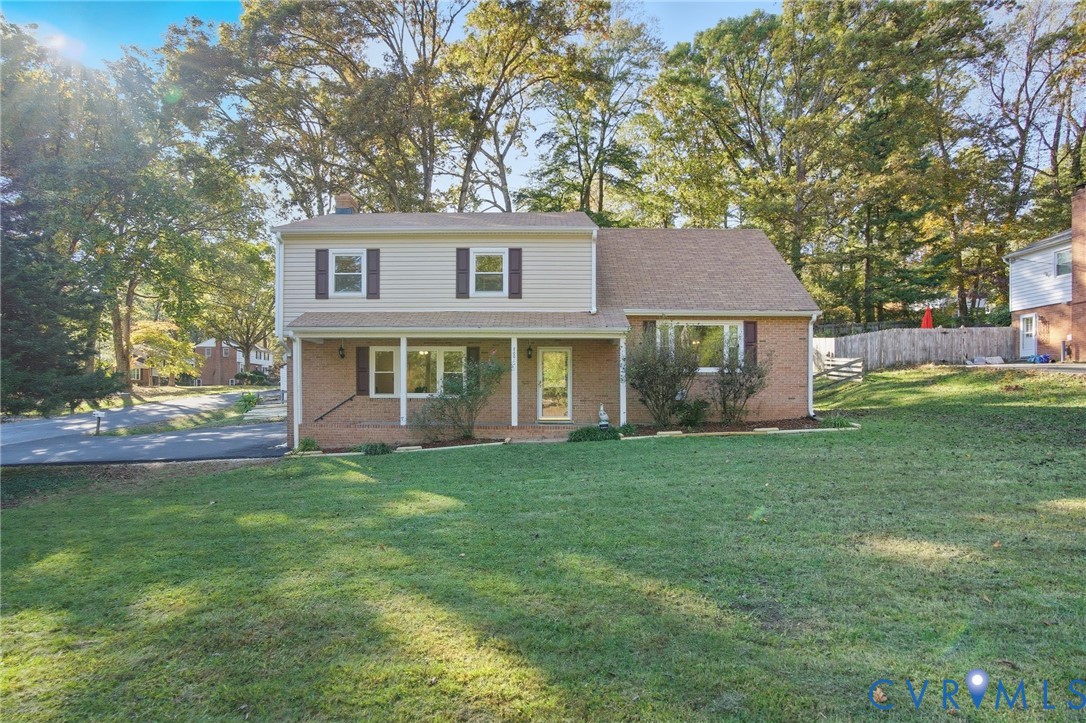700 Brantley Road North Chesterfield, VA 23235 - Photo 2 of 40 a front view of a house with a garden
