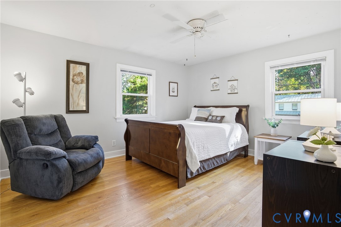 700 Brantley Road North Chesterfield, VA 23235 - Photo 26 of 40 a bedroom with a bed couch and window