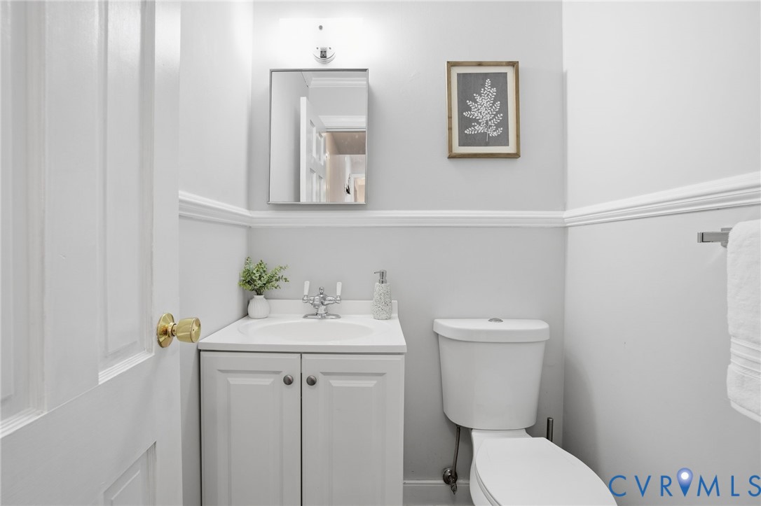 700 Brantley Road North Chesterfield, VA 23235 - Photo 30 of 40 a bathroom with a toilet sink and mirror