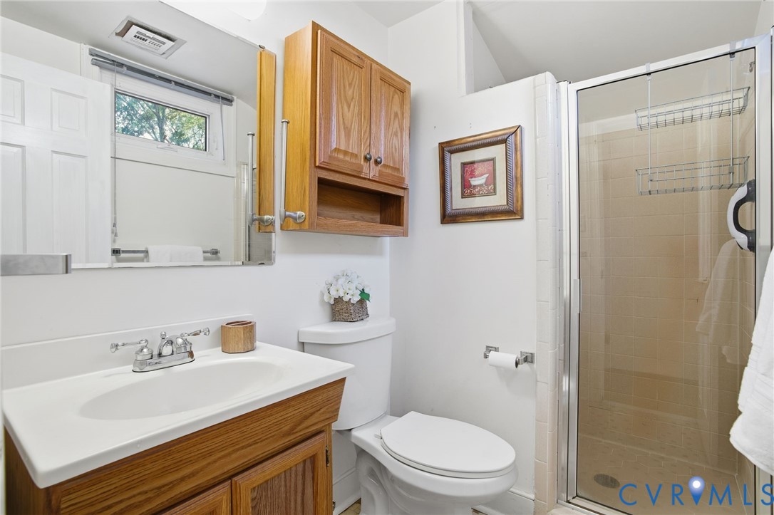 700 Brantley Road North Chesterfield, VA 23235 - Photo 31 of 40 a bathroom with a sink a toilet and shower