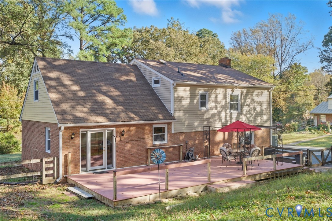 700 Brantley Road North Chesterfield, VA 23235 - Photo 39 of 40 a view of a patio with a table chairs and a fire pit