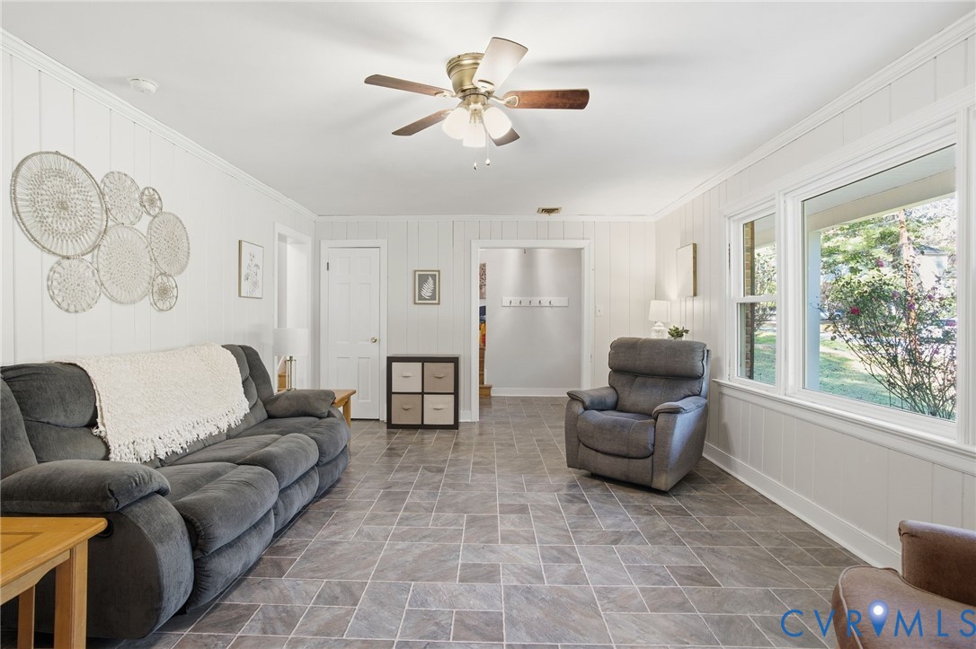 700 Brantley Road North Chesterfield, VA 23235 - Photo 9 of 40 a living room with furniture and a large window