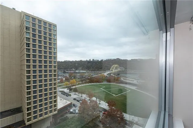 a view of swimming pool from balcony