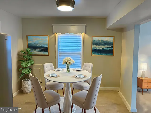 a view of a dining room with furniture