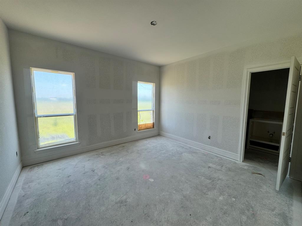 173 Willow Branch Road McGregor, TX 76657 - Photo 11 of 18 an empty room with a window
