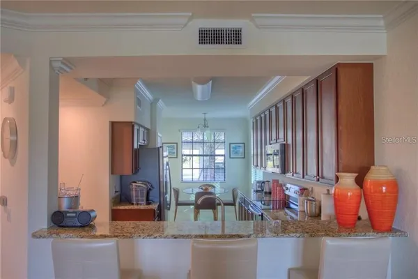 a kitchen with sink and window