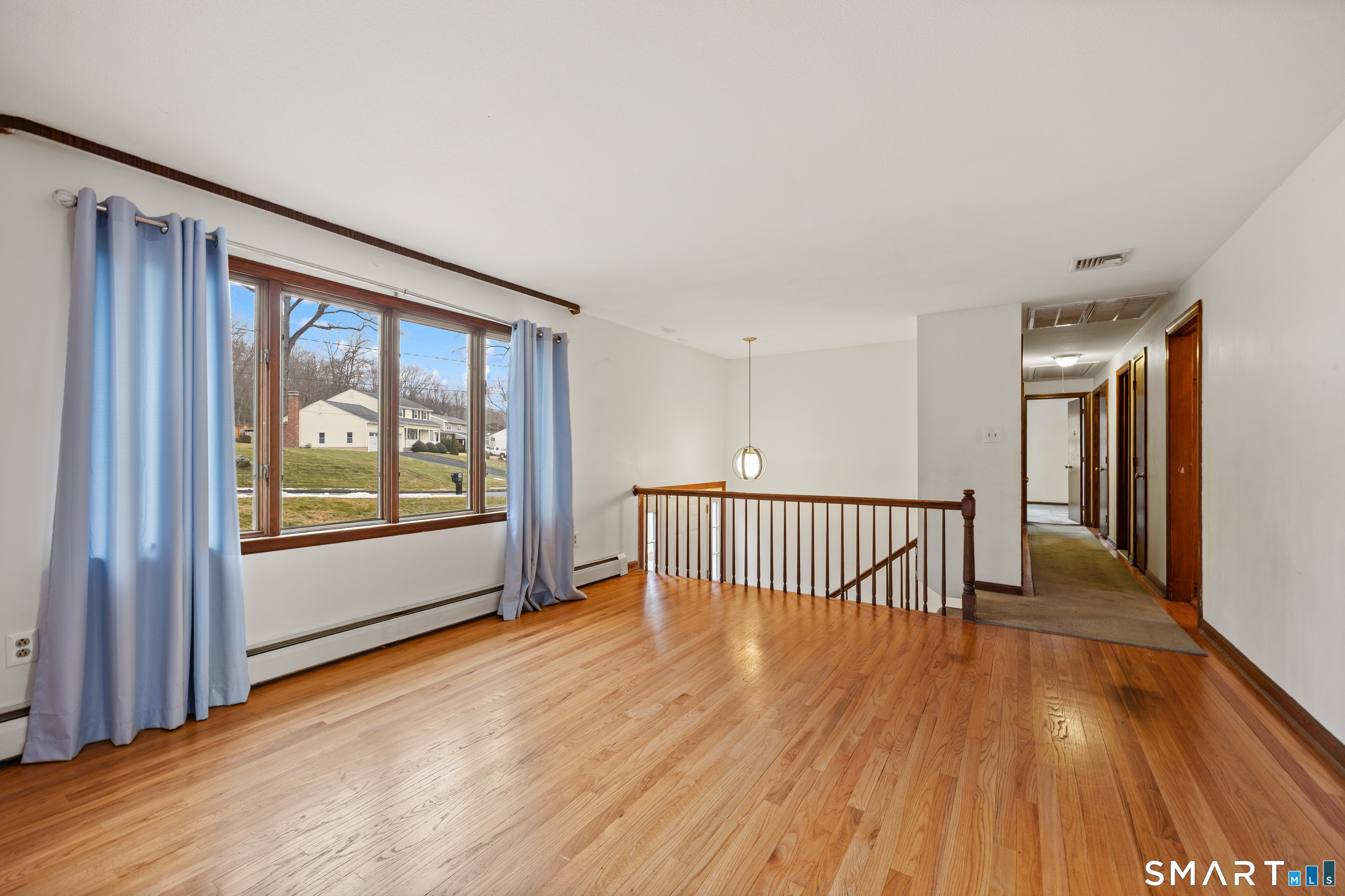 60 Roseanna Road Southington, CT 06479 - Photo 12 of 35 a view of livingroom with furniture and wooden floor