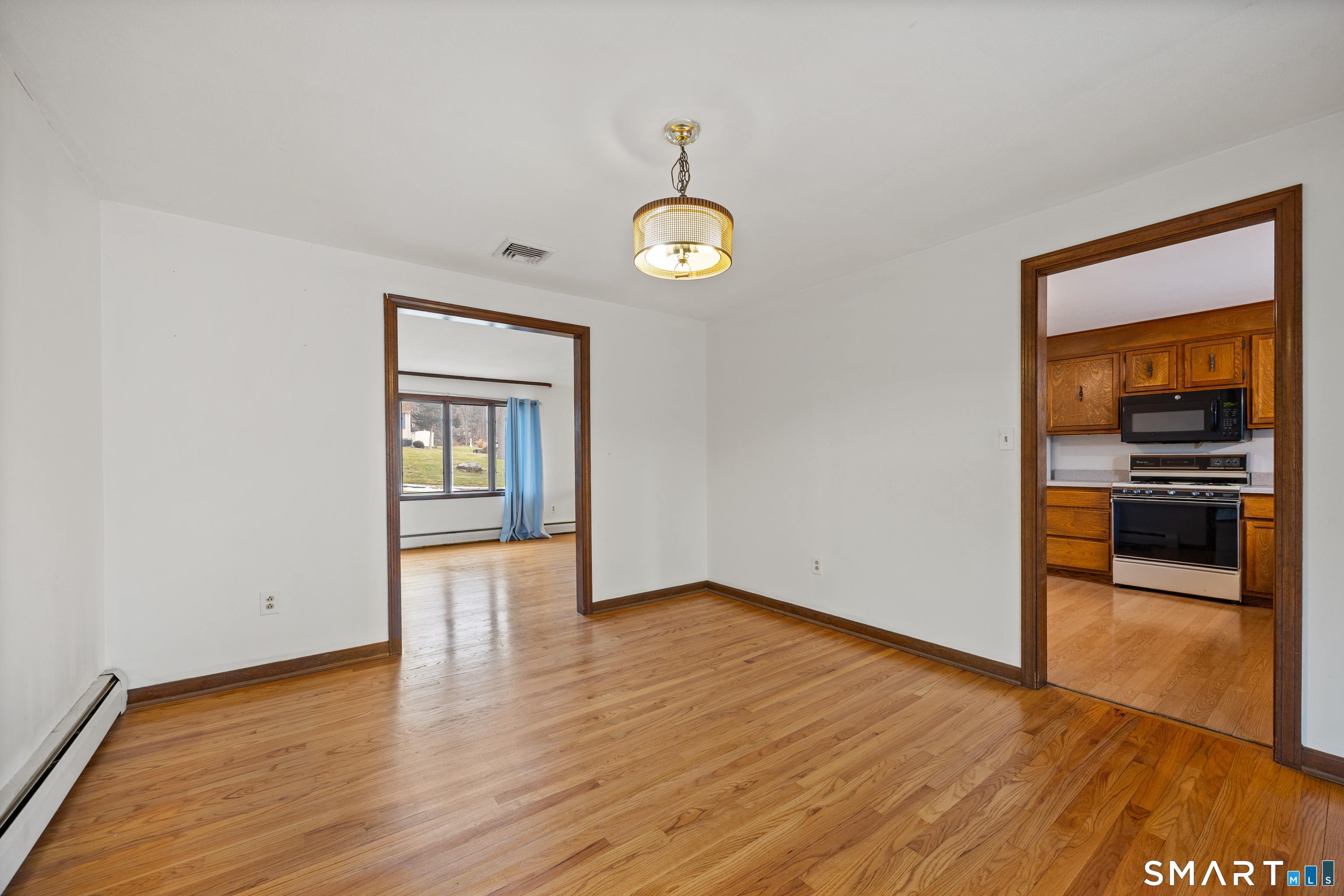 60 Roseanna Road Southington, CT 06479 - Photo 15 of 35 a view of a hallway with wooden floor