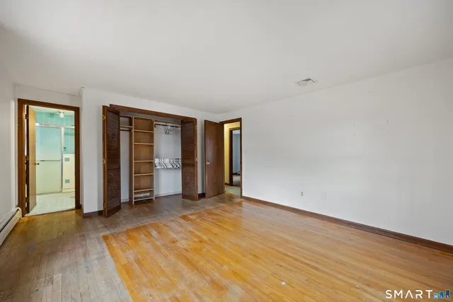 an empty room with closet