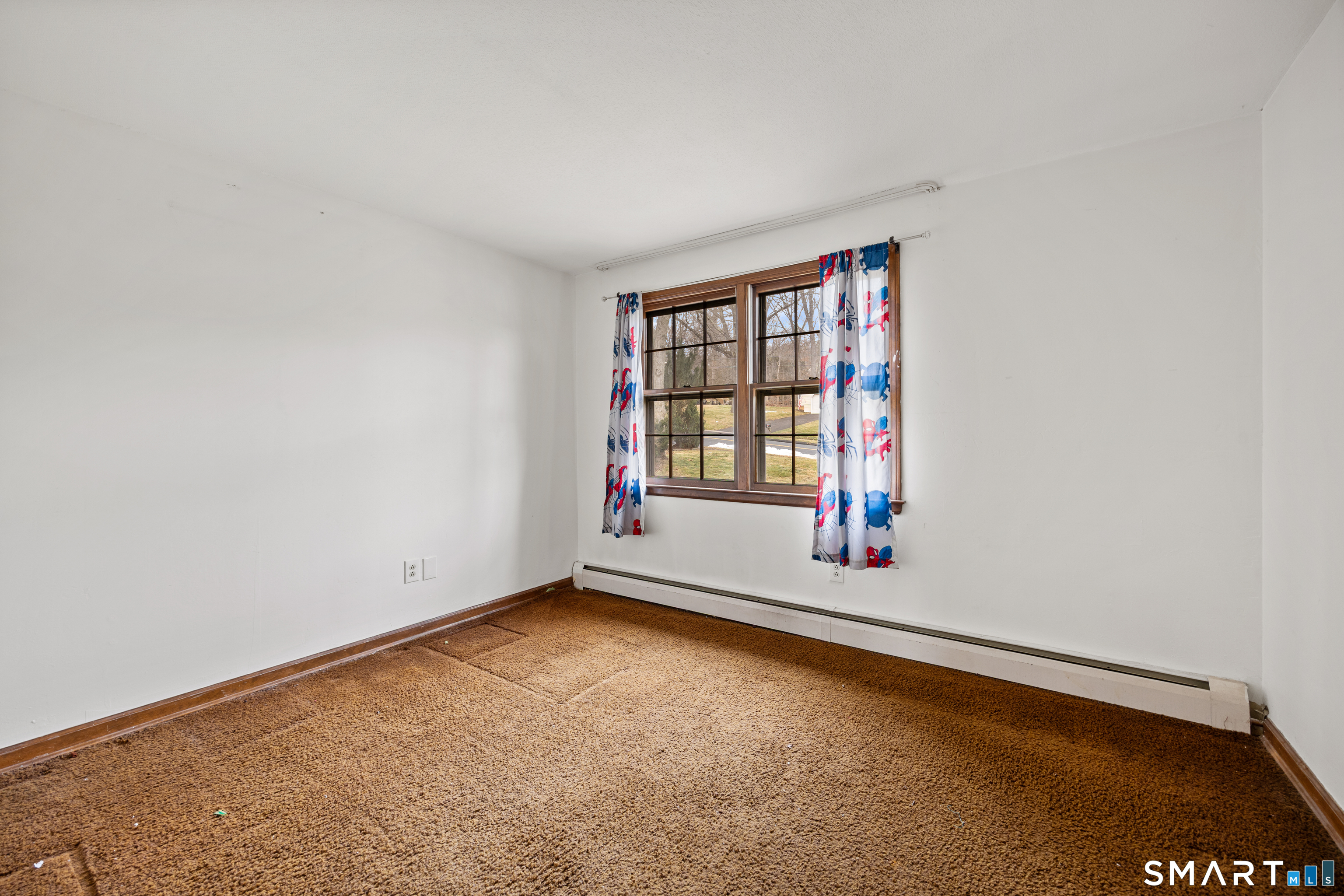 60 Roseanna Road Southington, CT 06479 - Photo 25 of 35 an empty room with windows