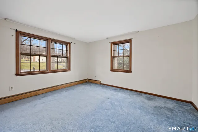 an empty room with windows