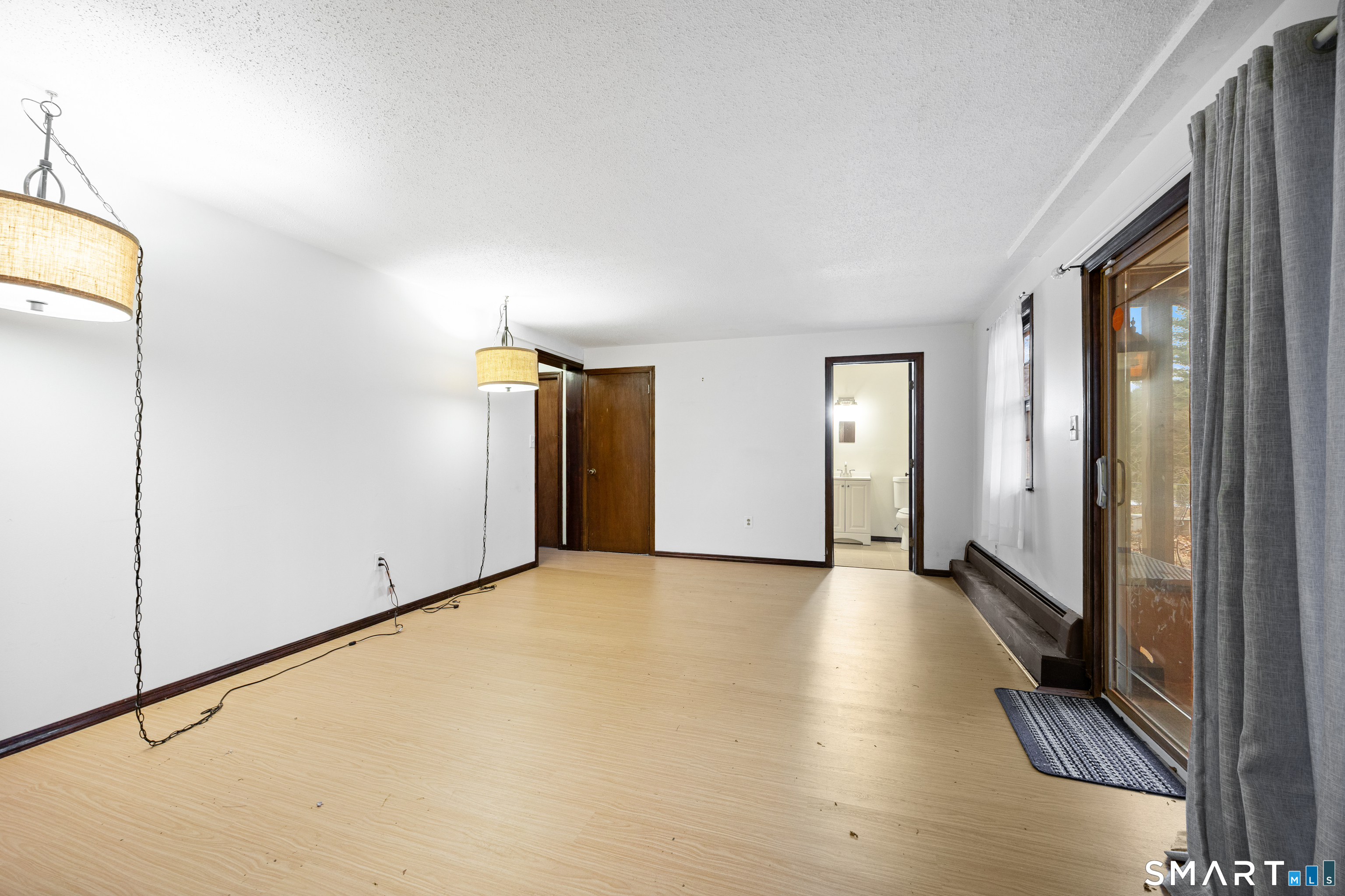 60 Roseanna Road Southington, CT 06479 - Photo 7 of 35 a view of a livingroom with wooden floor