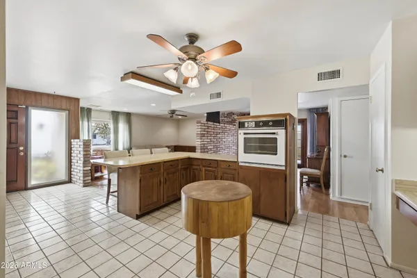 a view of a kitchen with washer and dryer