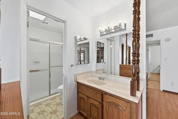 a bathroom with a bathtub and shower