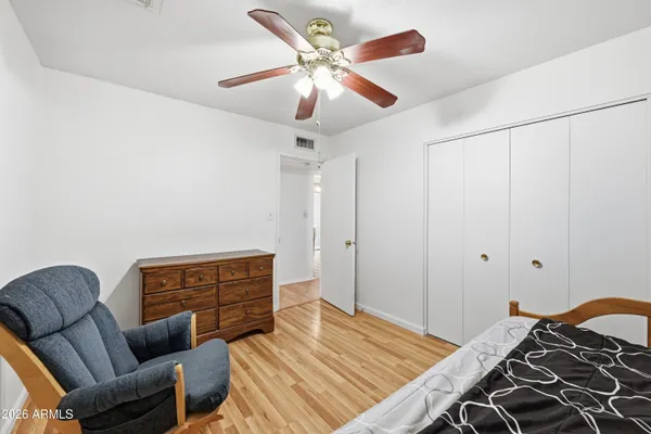 a view of a patio with table and chairs and potted plants