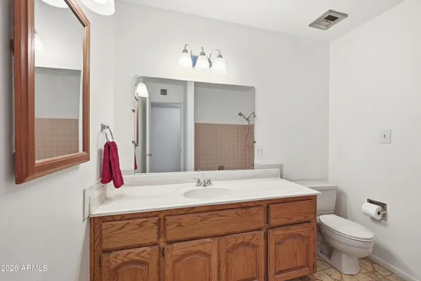 a outdoor space with a table and chairs