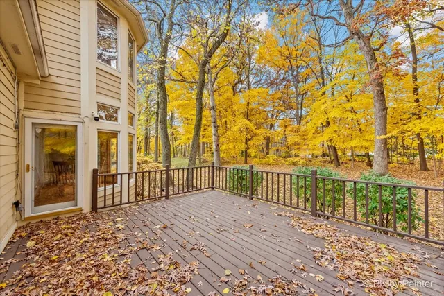 a view of a brick house with a large window