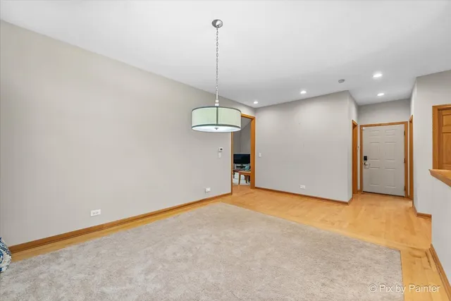 a view of a kitchen with a chandelier