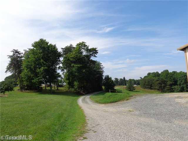 2229 Pannel Road Madison, NC 27025 - Photo 11 of 16 Exterior Front. Property is all to the right of the road