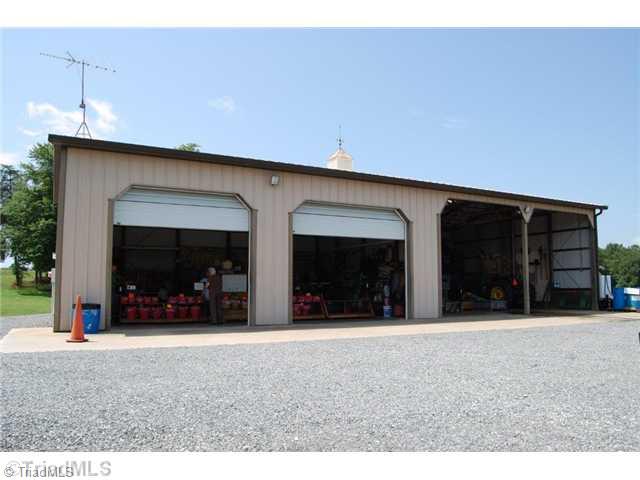 2229 Pannel Road Madison, NC 27025 - Photo 6 of 16 Workshop. 68x30 220 Amp service and air compressor.. 2 large bay doors