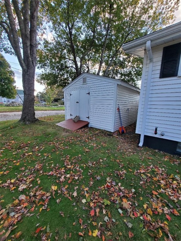 296 Fish Road Tiverton, RI 02878 - Photo 3 of 18 GARDEN AND TOOL SHED OFFER AMPLE ROOM TO TINKER IN.