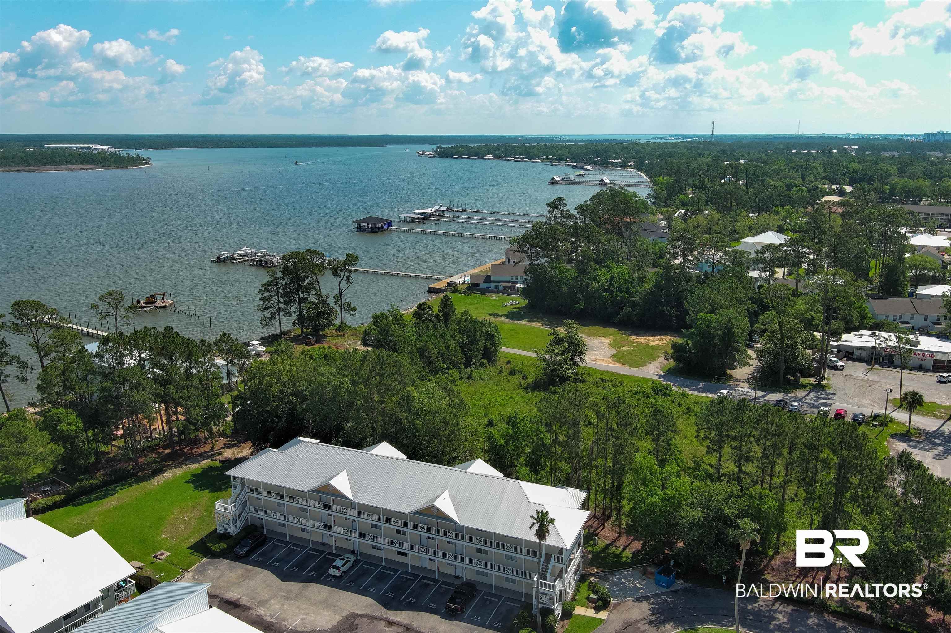 25909 Canal Road, Unit 301 Orange Beach, AL 36561 - Photo 31 of 43 Birds eye view of property featuring a water view