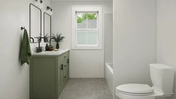 a bathroom with a double vanity sink and a mirror