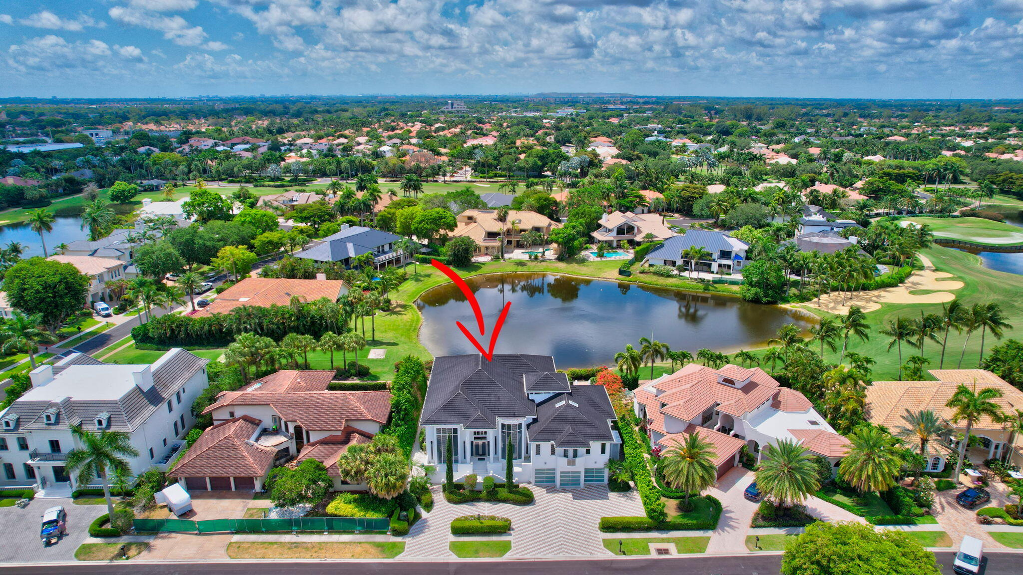 7208 Valencia Drive Boca Raton, FL 33433 - Photo 2 of 73 an aerial view of residential houses with outdoor space and lake view