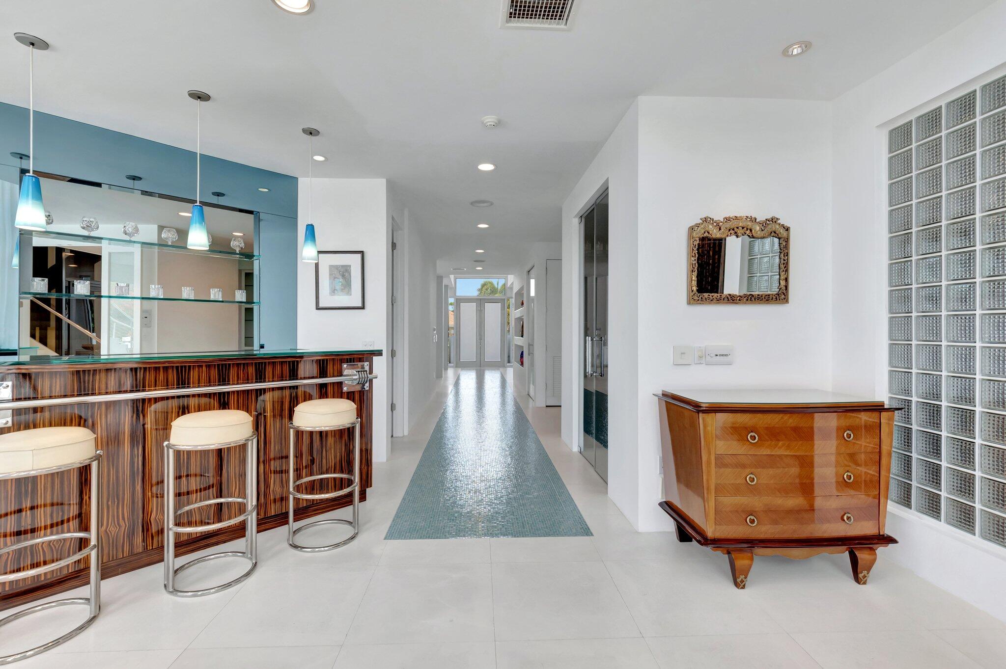 7208 Valencia Drive Boca Raton, FL 33433 - Photo 25 of 73 a room with wooden floor and furniture