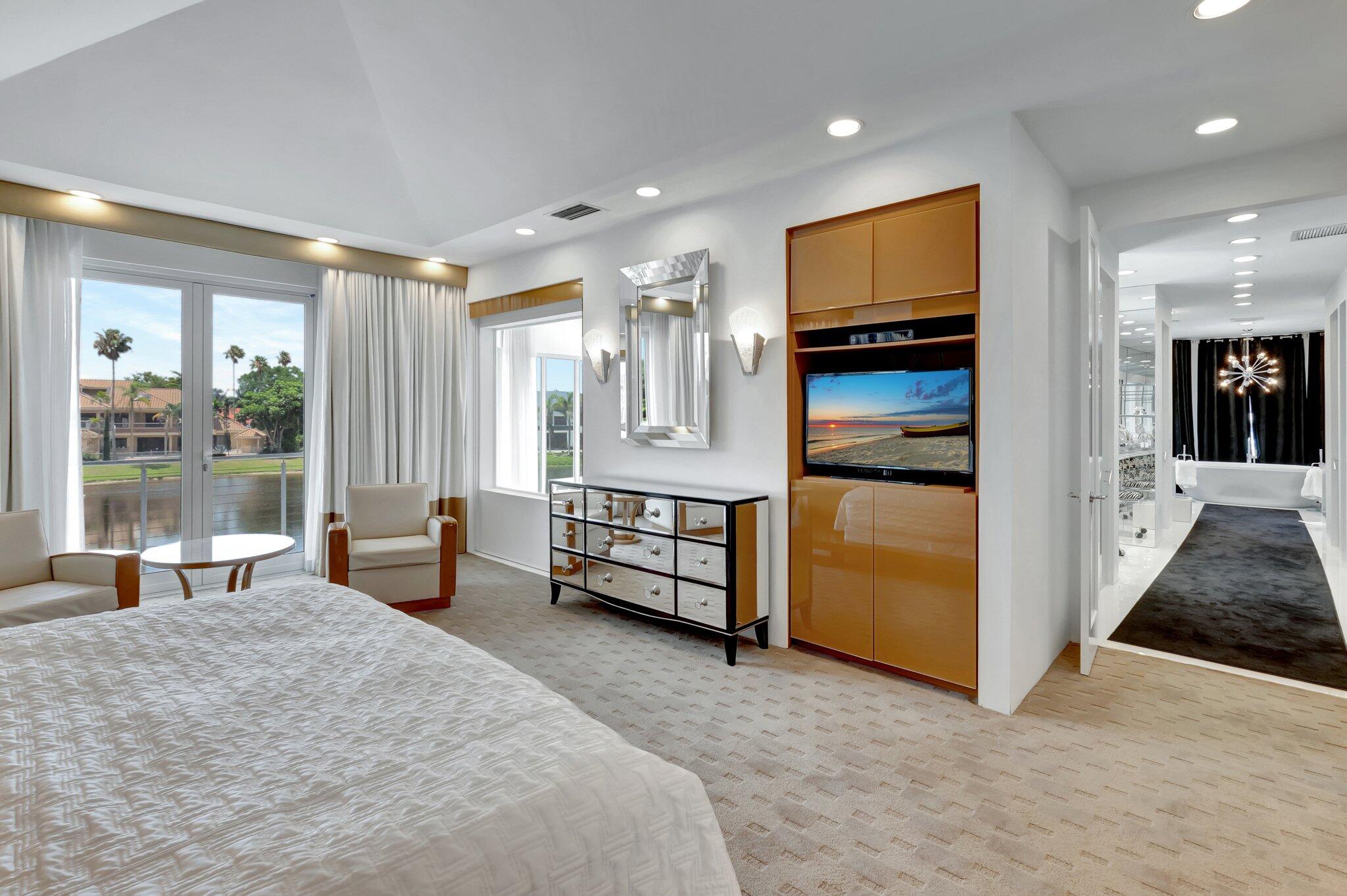 7208 Valencia Drive Boca Raton, FL 33433 - Photo 38 of 73 a bedroom with furniture and a window