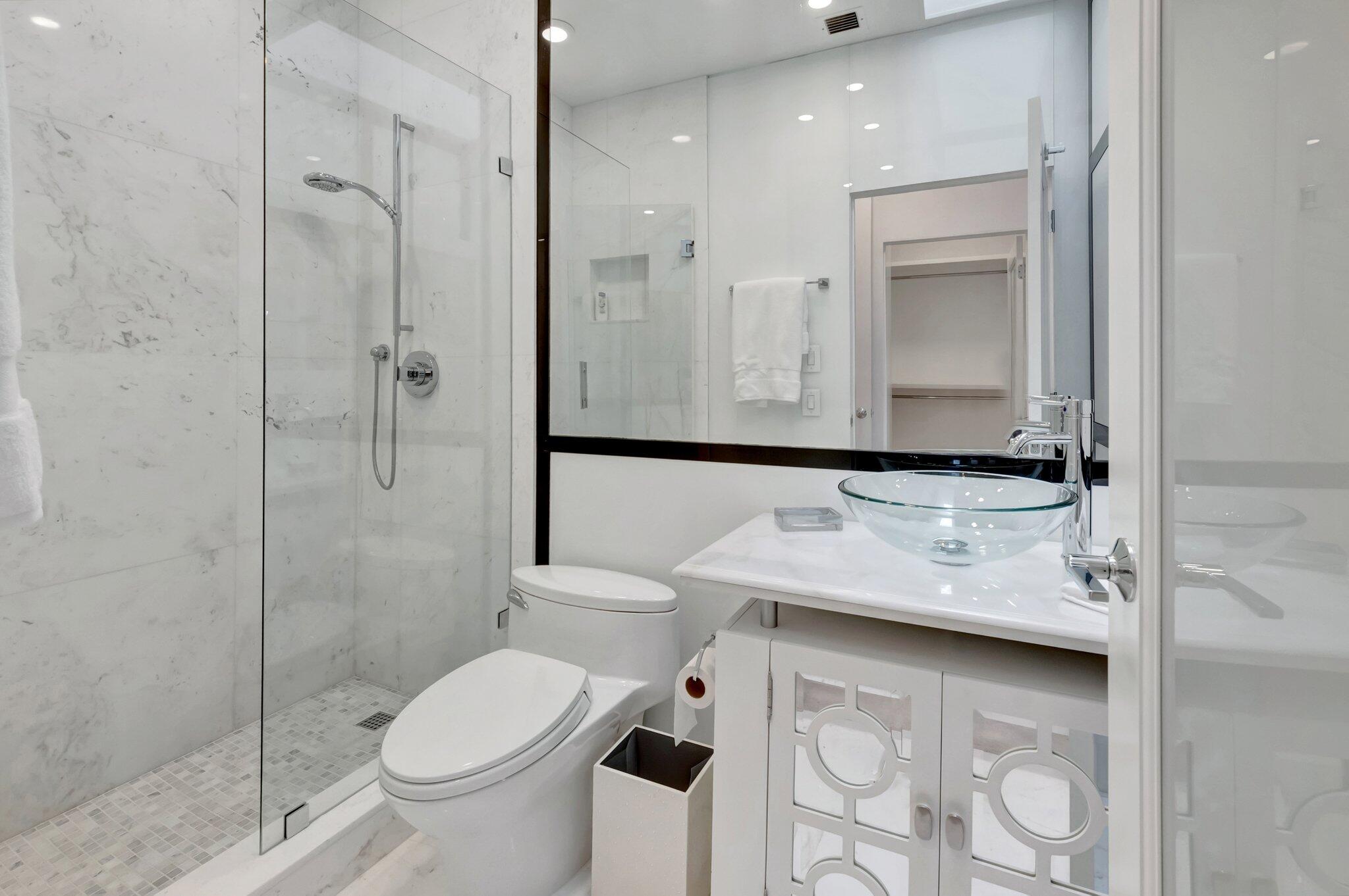 7208 Valencia Drive Boca Raton, FL 33433 - Photo 45 of 73 a bathroom with a sink toilet and shower