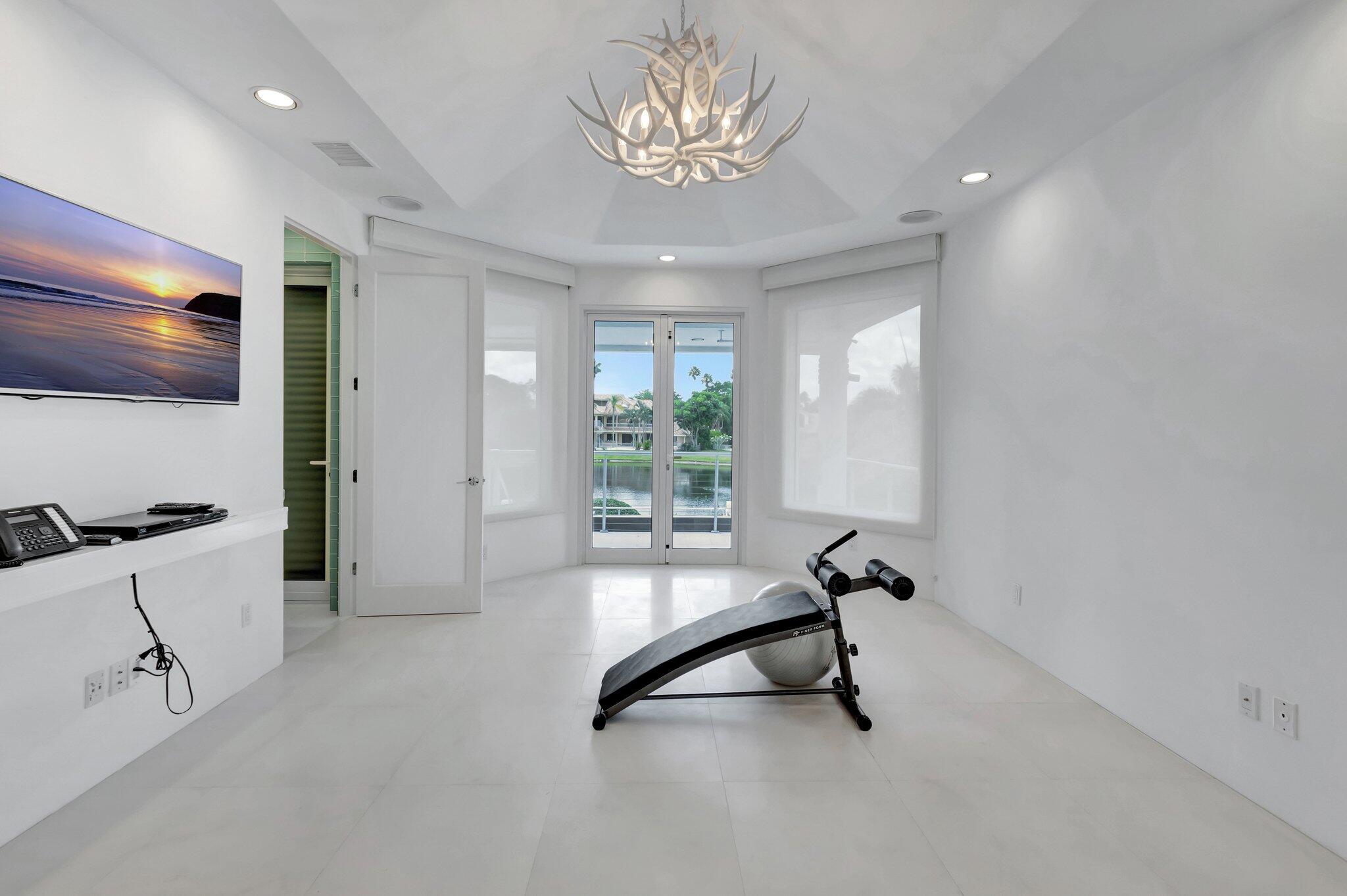 7208 Valencia Drive Boca Raton, FL 33433 - Photo 48 of 73 a view of a room with gym equipment