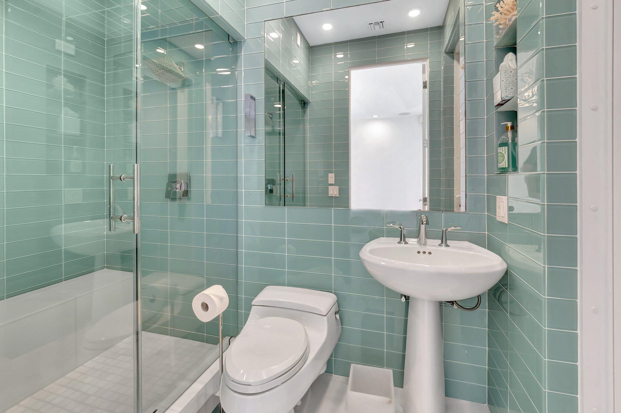 7208 Valencia Drive Boca Raton, FL 33433 - Photo 49 of 73 a bathroom with a sink toilet and shower