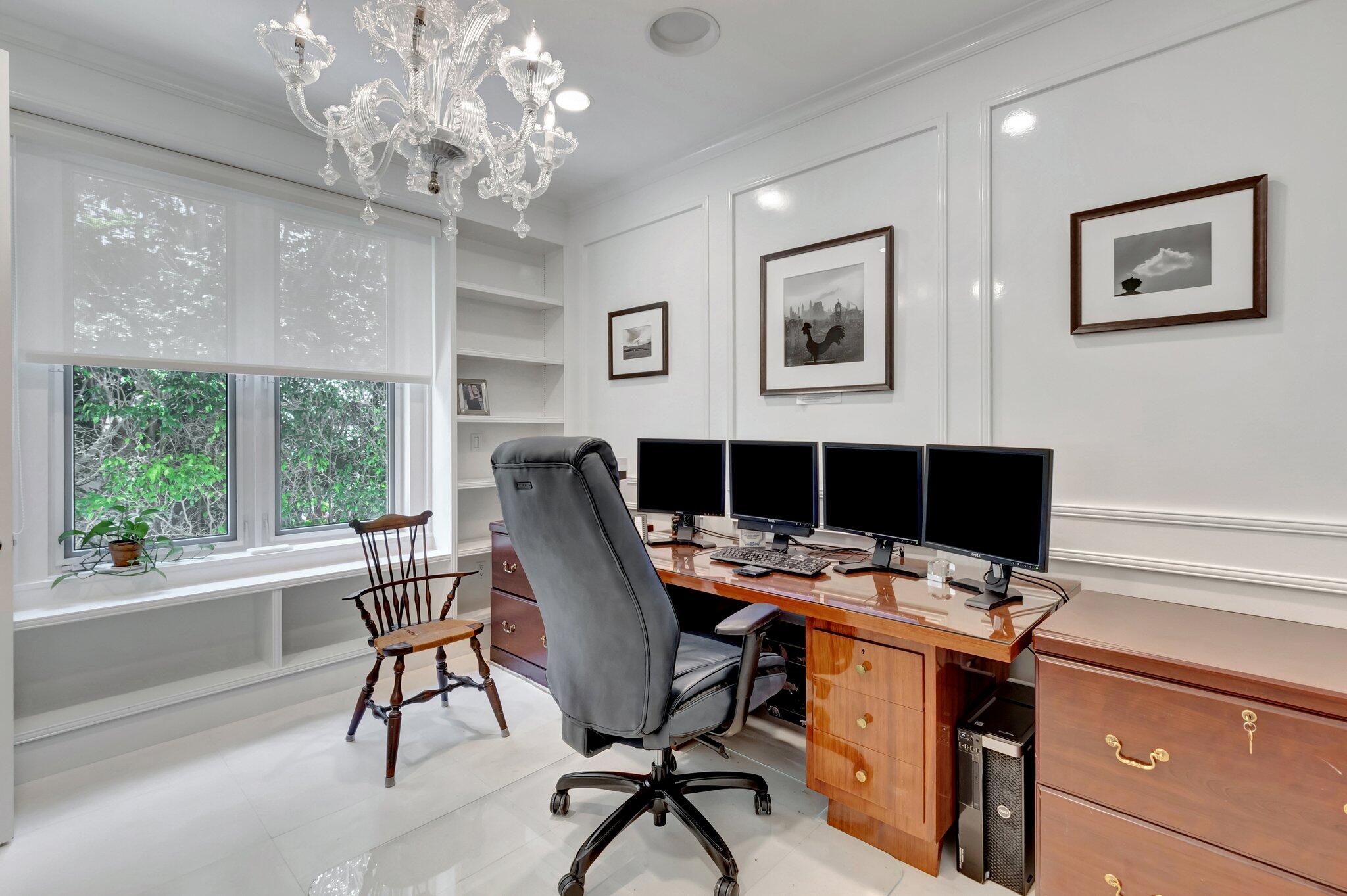 7208 Valencia Drive Boca Raton, FL 33433 - Photo 50 of 73 a workspace with furniture and a chandelier