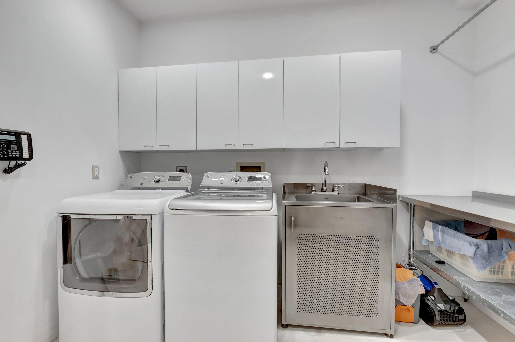 7208 Valencia Drive Boca Raton, FL 33433 - Photo 54 of 73 a utility room with dryer and washer