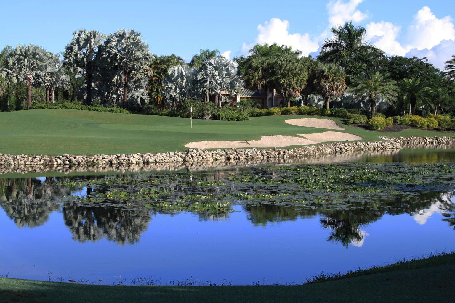 7208 Valencia Drive Boca Raton, FL 33433 - Photo 65 of 73 a view of a lake from a yard